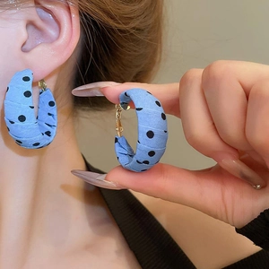 Retro light blue polka dot fabric wrapped C-shaped hoop earrings with silver needle