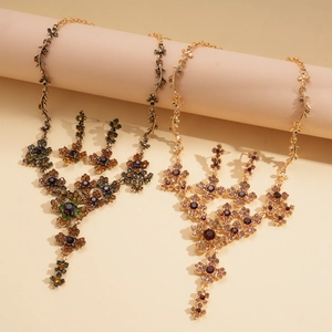 Floral tassel necklace set with rhinestones in bohemian vintage style and bronze finish