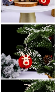Detail of red and grey plush pom-pom reindeer ornaments with wooden faces for Christmas tree