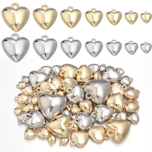 Golden and silver heart pendants in various sizes for DIY necklace and bracelet jewelry