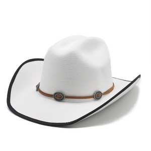 Close-up of white felt cowboy hat with brown leather band and vintage metal buckles