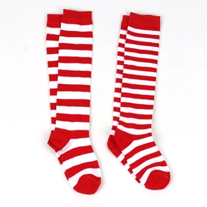 Close-up of red and white striped knitted knee-high socks for Christmas cosplay outfits