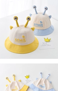 Detail of snail-themed baby bucket hat with 3D antennae and snail embroidery
