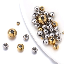 Macro detail of polished gold and silver stainless steel spacer beads for DIY jewelry