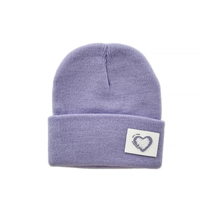 Purple knit beanie for kids with folded cuff and white heart patch on plain background