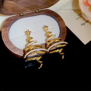 Sparkling gold plated Christmas tree stud earrings with zircon spiral and star detail