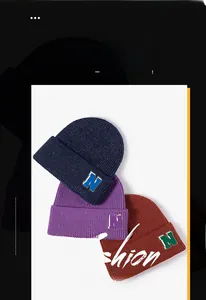 Close-up of ribbed knit beanies in navy, purple, and rust red with 'N' patch detail
