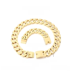 Macro view of 30mm gold stainless steel Cuban link necklace and bracelet set