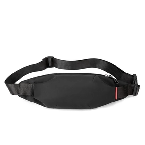 Waterproof black crossbody chest bag for men with adjustable strap and red side label detail