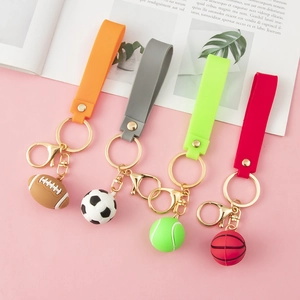 3D sports ball keychains with football, basketball, tennis, and rugby pendants