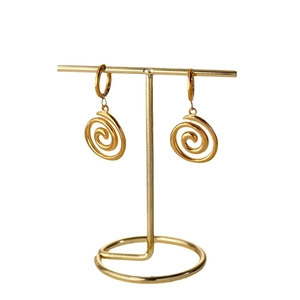 French vintage 18k gold plated hoop earrings with spiral charms on a gold display stand