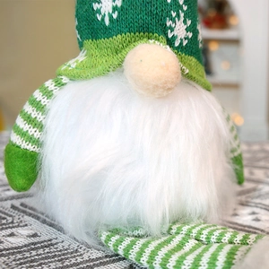 Lighted Christmas gnome doll with snowflake knit hat and striped long legs decoration