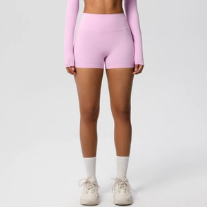 Front view of high-waisted lavender yoga shorts showing body-shaping fit and matte texture