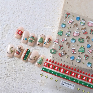 Macro view of TS-3844 Christmas 5D embossed nail stickers with reindeer and tree motifs