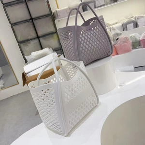 Hollow out silicone tote baskets in white and lilac colors for beach and picnic use
