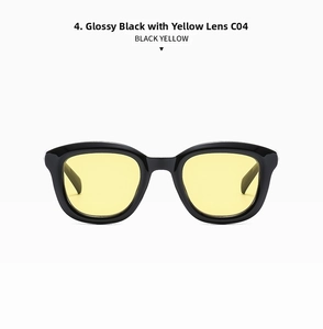 Detail view of round retro sunglasses with shiny black frames and yellow lenses C04