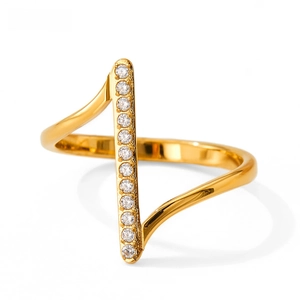 Close-up of gold-plated minimalist ring with vertically set sparkling zircon stones