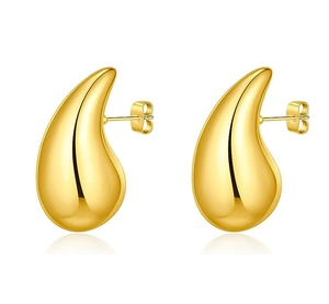 Detail view of gold chubby teardrop earrings with smooth 18K finish and butterfly backs