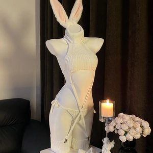 Detailed knit texture of white rabbit girl bodysuit with garter belts and stockings