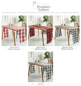 Detail view of four-color plaid Christmas table runners in minimalist Nordic style cotton