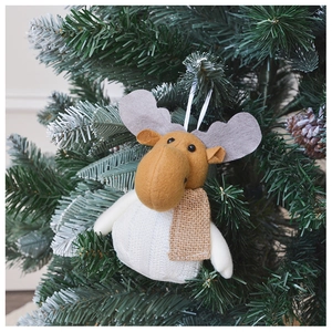 Close-up of a plush reindeer ornament with a grey scarf hanging on a Christmas tree