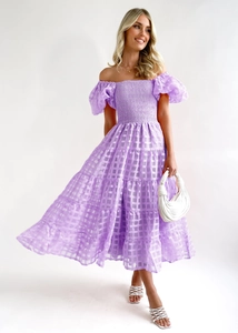 Detailed view of lavender checkered off-shoulder dress with layered ruffle hemline