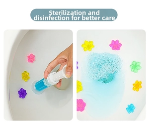 Macro shot of manual toilet cleaning gel applicator and floral gel flowers on bowl wall