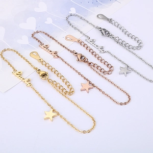 Three-color lucky letter and star charms bracelet set in gold, rose gold, and silver finishes