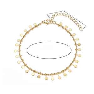 Detail of 18K gold plated copper bracelet with dangling round polished metal charms