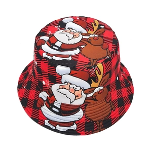 Christmas bucket hat featuring red plaid pattern with cartoon Santa and reindeer print
