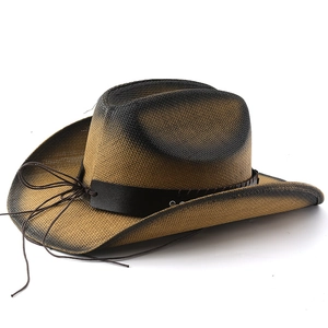Detail of western cowboy hat featuring gradient woven straw texture and faux leather band