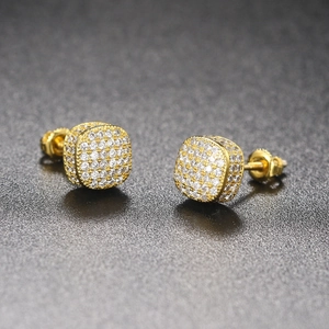 Close-up of gold plated iced out square stud earrings with micro paved cubic zirconia