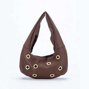 Deep brown suede shoulder bag with gold rivet studs in a chic crescent hobo bag style
