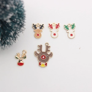 Detailed view of five colorful enamel reindeer charms for DIY Christmas jewelry making