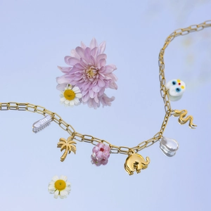 Gold stainless steel necklace with pearl, palm tree, elephant and floral charms
