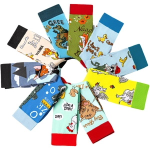 Detailed macro view of colorful cartoon animal knit cotton socks in vibrant various patterns