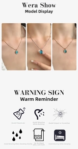 Detailed view of elegant blue cat eye stone pendant on gold-plated titanium steel necklace