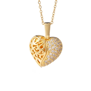 Golden heart pendant necklace with openwork pattern and sparkling zircon stones