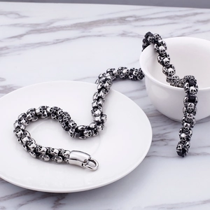 Detail of gothic silver skull bracelet showing 3D carving and oxidized metal finish