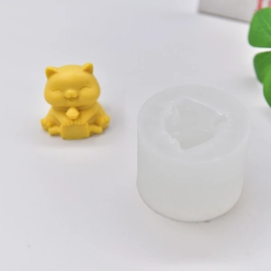 Cat shaped silicone mold for DIY candles and soap with finished yellow resin cat model