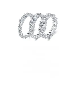Detailed close-up of three S925 sterling silver eternity rings with sparkling pavé stones