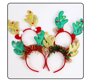 Detail of four Christmas reindeer antler headbands with sequins and colorful tinsel trim