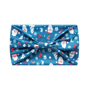 Blue Christmas headband with Santa and tree patterns featuring a stylish center knot