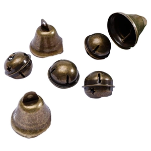 Set of vintage bronze metal bells with star cutouts for Christmas DIY and pet collars
