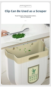 Detail showing the white foldable kitchen trash bin with a khaki rim on a marble countertop