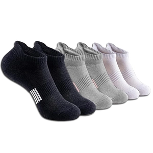 Three pairs of breathable sports low cut socks in black, grey and white with arch support