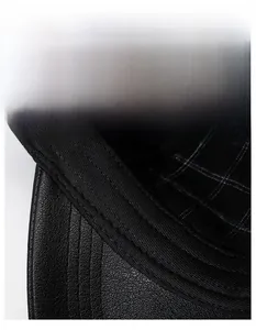 Detail of winter baseball cap featuring moisture-wicking sweatband and leather texture