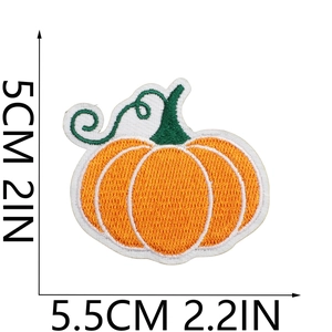 Detailed embroidery texture of orange pumpkin patch with 5cm size dimension display