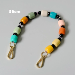 Close-up of 36cm colorful handmade resin beaded strap with golden lobster clasps