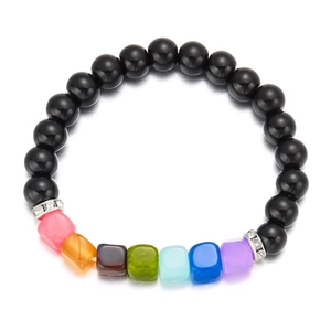 Macro shot of tiger eye beads bracelet with multicolor square stones and rhinestone spacers